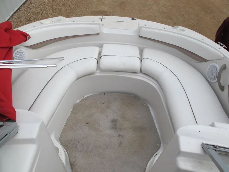 Slide: The Image of 2005 Four Winns 194 Funship boat interior with white seating and red cover. - 7