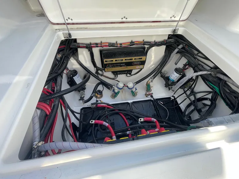 Slide: The Image of 2025 Sea Pro 292 Off Shore boat wiring and battery compartment. - 12