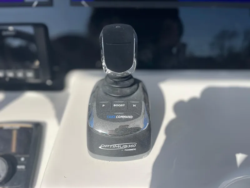 Slide: The Image of Joystick control on 2025 Sea Pro 292 Off Shore boat dashboard. - 20