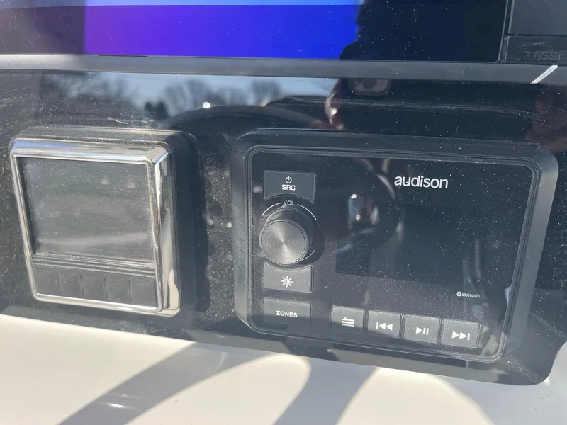 Slide: The Image of Control panel of 2025 Sea Pro 292 Off Shore boat with Audison audio system. - 22