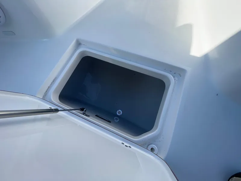 Slide: The Image of 2025 Sea Pro 292 Off Shore storage compartment, open and empty. - 32