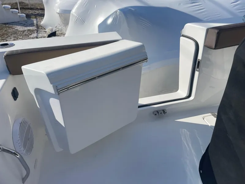 Slide: The Image of 2025 Sea Pro 292 Off Shore boat interior with seating and storage features. - 36