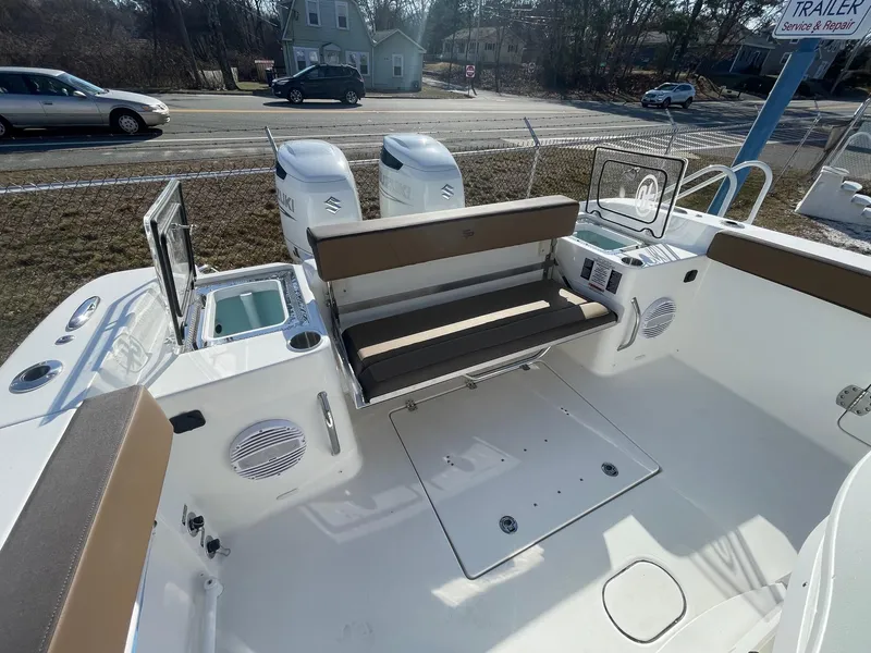 Slide: The Image of 2025 Sea Pro 292 Off Shore boat interior with seating and dual engines. - 9