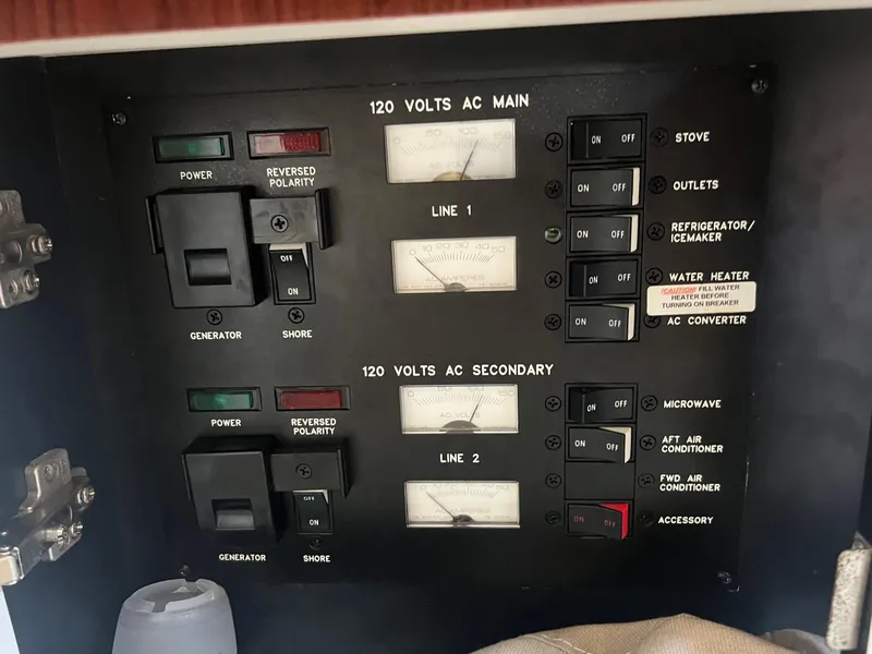 Slide: The Image of Electrical control panel on a 2001 Sea Ray 340 Amberjack boat. - 22