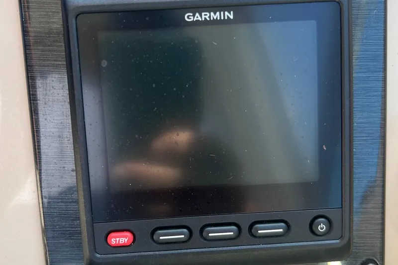 Slide: The Image of Garmin marine display on 2001 Sea Ray 340 Amberjack boat dashboard. - 26