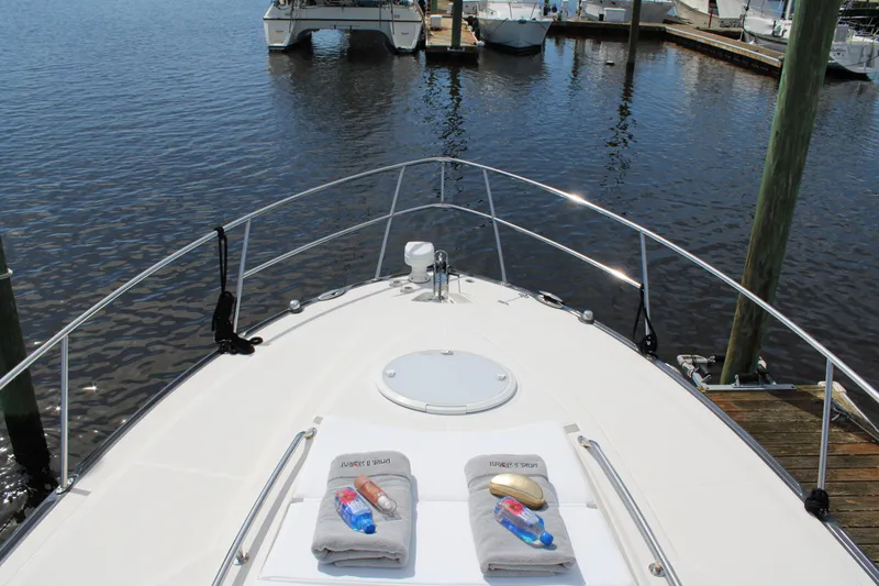 Slide: The Image of Bow view of 2013 Monterey 340 Sport Yacht docked at marina. - 24