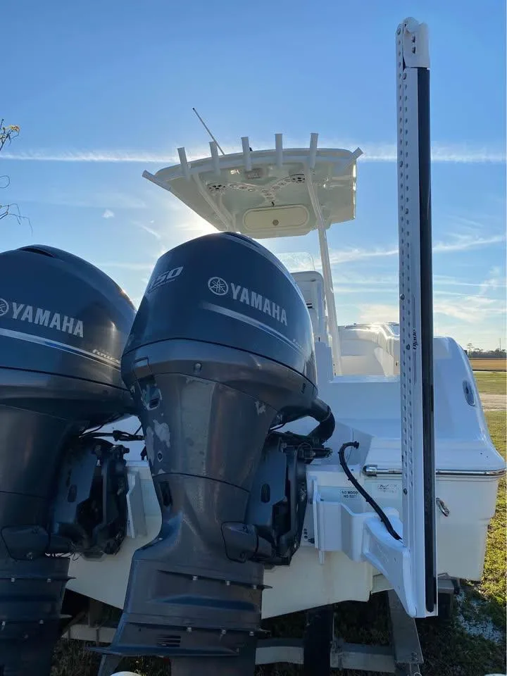 Slide: The Image of 2014 Sea Fox 256 Commander boat with dual Yamaha outboard engines. - 10