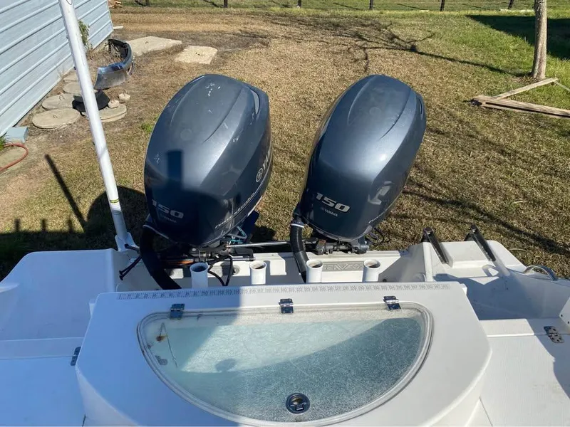 Slide: The Image of 2014 Sea Fox 256 Commander boat with dual 150 horsepower engines. - 11