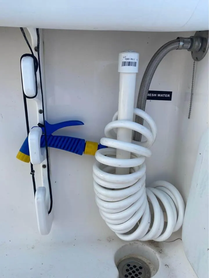 Slide: The Image of Freshwater hose setup on 2014 Sea Fox 256 Commander boat. - 13