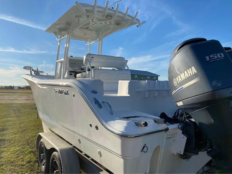 Slide: The Image of 2014 Sea Fox 256 Commander boat with Yamaha 150 engine on trailer. - 3