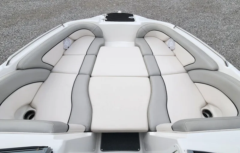 Slide: The Image of 2011 Yamaha AR240 High Output boat interior with cushioned seating. - 12