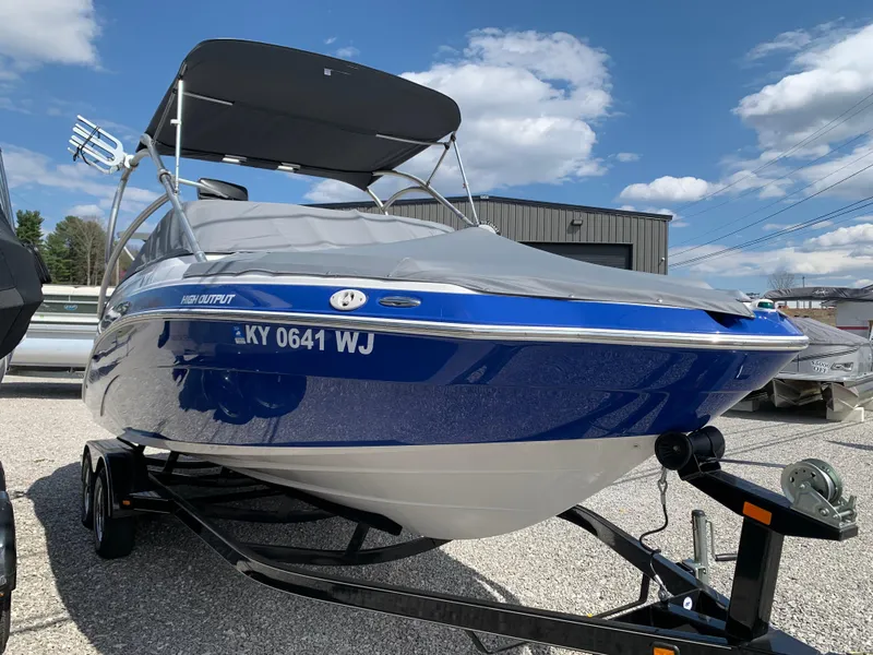 Slide: The Image of 2011 Yamaha AR240 High Output boat on trailer under blue sky. - 15