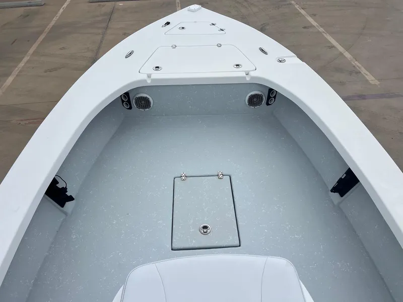 Slide: The Image of 2018 Blazer 2420 GTS boat interior with storage compartments and speakers. - 14
