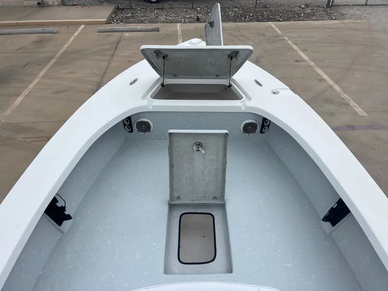 Slide: The Image of 2018 Blazer 2420 GTS boat interior with open storage compartments. - 15