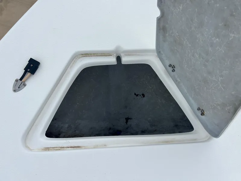 Slide: The Image of Open hatch on 2018 Blazer 2420 GTS boat deck. - 16