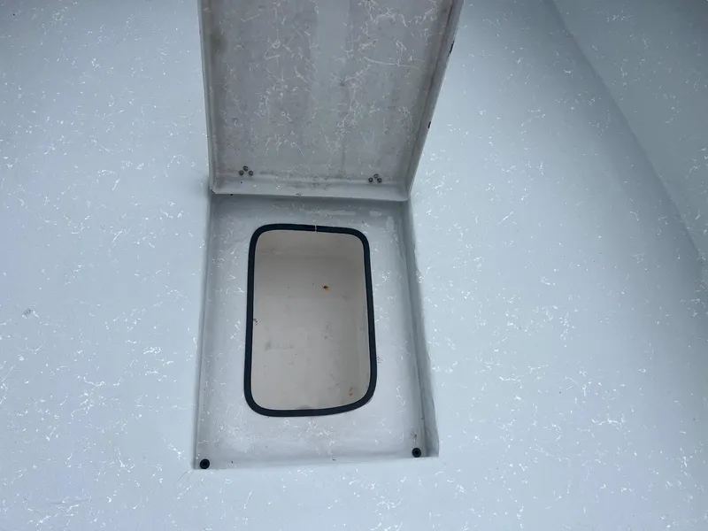 Slide: The Image of Open storage compartment on 2018 Blazer 2420 GTS boat deck. - 18