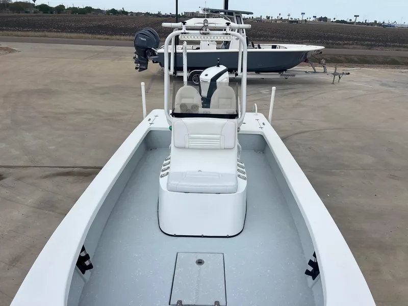 Slide: The Image of 2018 Blazer 2420 GTS boat on trailer, featuring spacious deck and seating. - 19