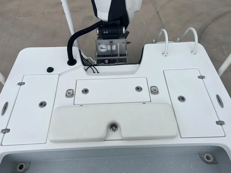 Slide: The Image of 2018 Blazer 2420 GTS boat deck with storage compartments and motor mount. - 25