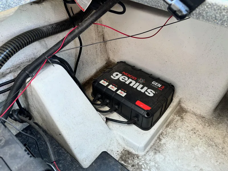 Slide: The Image of NOCO Genius GEN3 battery charger in a 2014 Nitro Z-8 boat compartment. - 11