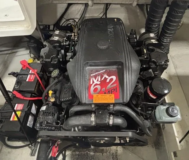 Slide: The Image of Engine compartment of a 2001 Cobalt 246 with a MerCruiser 6.2 MPI engine. - 25
