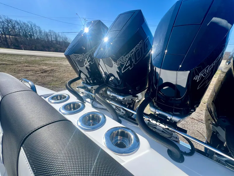 Slide: The Image of 2025 Nor-Tech 390 Sport Center Console with triple Mercury 400R engines. - 10