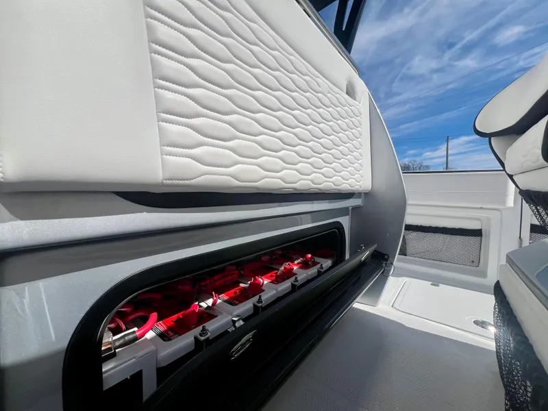 Slide: The Image of 2025 Nor-Tech 390 Sport Center Console interior with sleek design and modern features. - 24