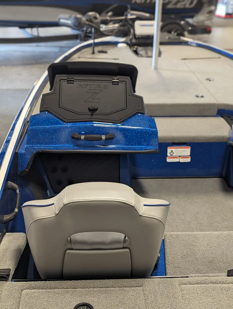 Slide: The Image of 2024 Nitro Z18Pro boat interior with blue accents and seating. - 12
