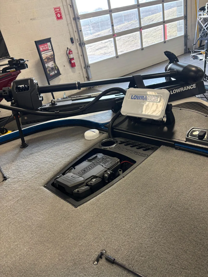 Slide: The Image of 2024 Nitro Z18Pro boat with Lowrance electronics in a garage setting. - 6