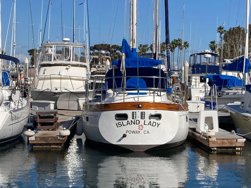 Slide: The Image of Sailboat "Island Lady" docked at marina, Nantucket Island 33, 1984 model. - 23