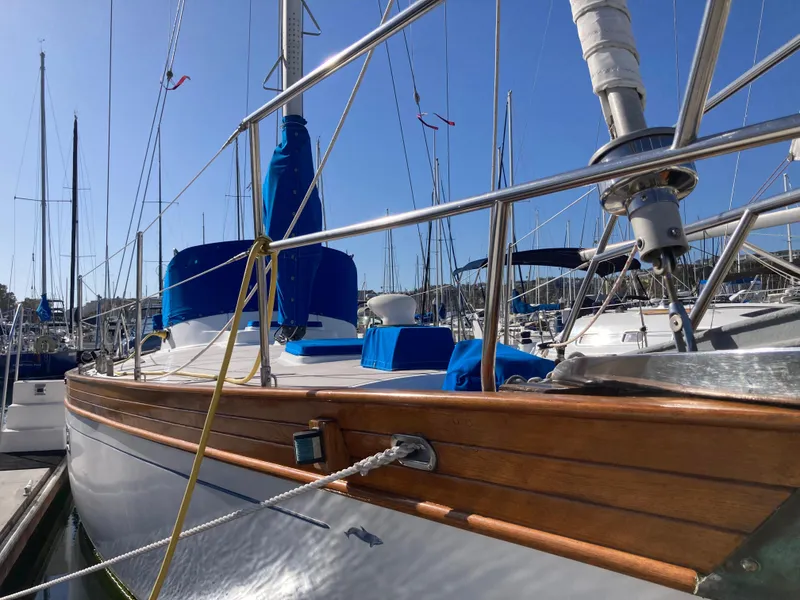 Slide: The Image of Sailboat Nantucket Island 33, 1984 model, docked in marina with blue covers. - 3