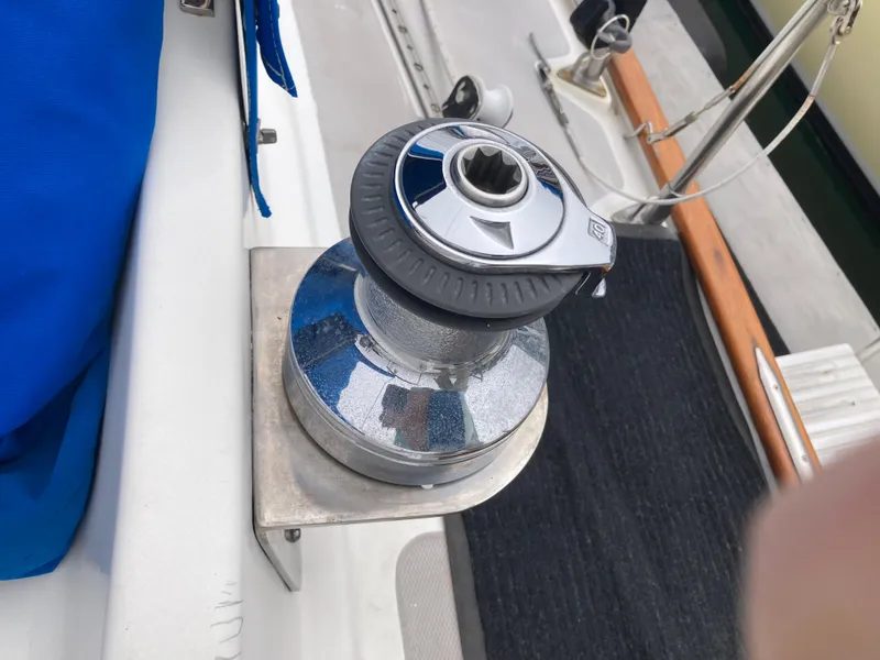 Slide: The Image of Chrome winch on 1984 Nantucket Island 33 sailboat deck. - 30