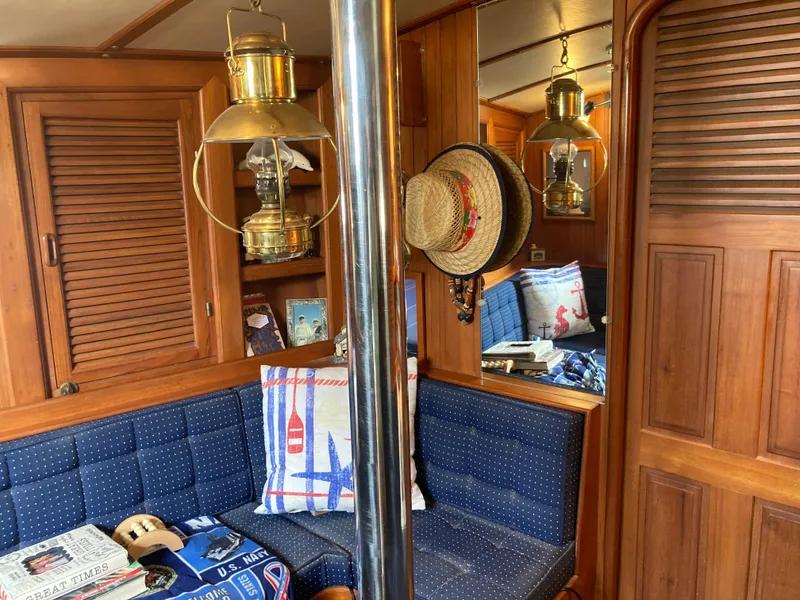 Slide: The Image of Cozy Nantucket Island 33 yacht interior with nautical decor and vintage lanterns, 1984 model. - 43