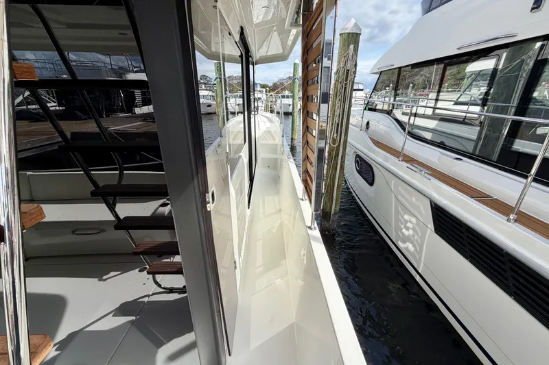 Slide: The Image of 2026 Beneteau Swift Trawler 41 Fly docked, showcasing sleek design and modern features. - 36