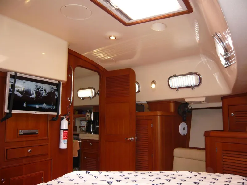 Slide: The Image of Luxurious interior of 2008 Island Packet 465 yacht with wood finish and modern amenities. - 32