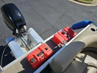 Slide: The Image of 2023 Sun Tracker Bass Buggy 16 XL Select with motor and fuel tanks on deck. - 15