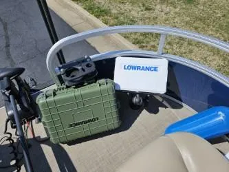 Slide: The Image of 2023 Sun Tracker Bass Buggy 16 XL Select with Lowrance equipment on deck. - 4