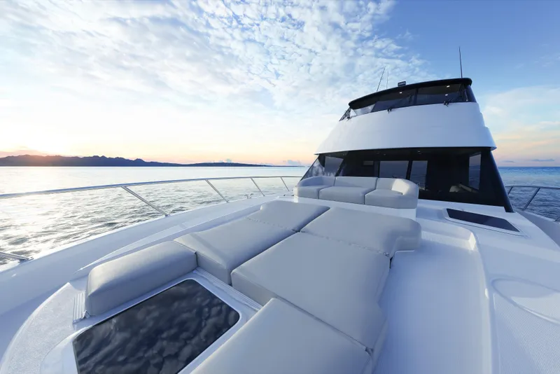 Slide: The Image of Luxury Maritimo M600 yacht on serene water at sunset, 2026 model. - 5