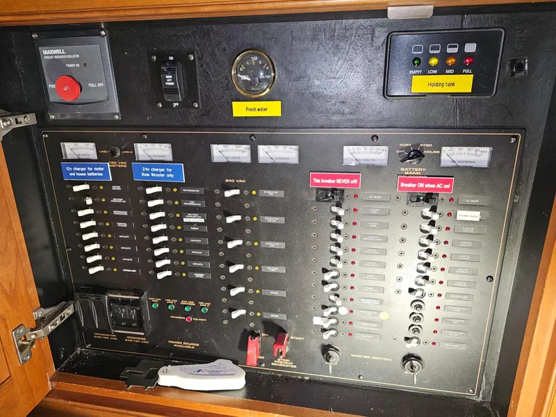 Slide: The Image of Electrical control panel on a 2001 Cruisers 5000 Sedan yacht. - 27