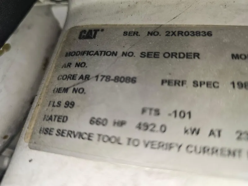 Slide: The Image of Label on machinery showing specifications, including serial number and horsepower, for a 2001 Cruisers 5000 Sedan. - 40
