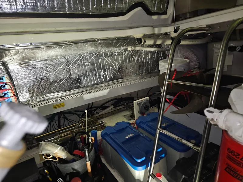 Slide: The Image of Engine room of a 2001 Cruisers 5000 Sedan with equipment and insulation. - 45