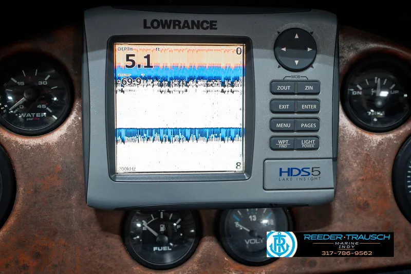 Slide: The Image of Lowrance HDS5 fishfinder on 1999 Triton TR-20 dashboard with gauges. - 34