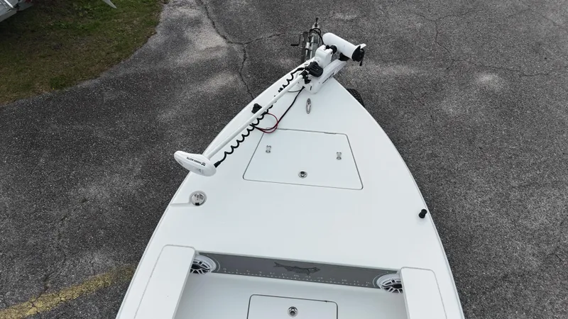 Slide: The Image of Aerial view of a 2023 Vtech 18 boat's bow with mounted equipment. - 8