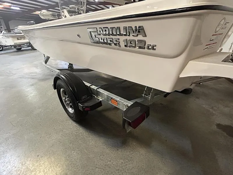Slide: The Image of 2024 Carolina Skiff 192 JLS boat on trailer in showroom. - 10