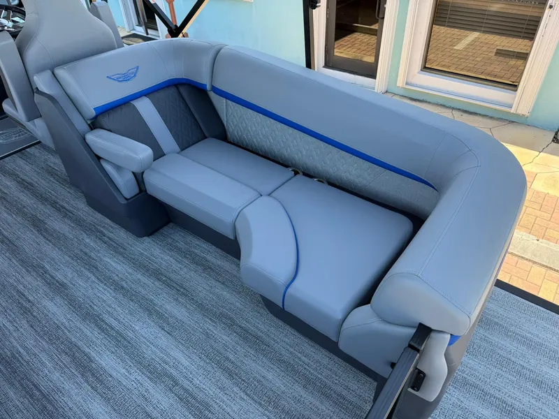 Slide: The Image of Luxurious seating on 2025 Bennington 24 MFB boat with gray and blue accents. - 7