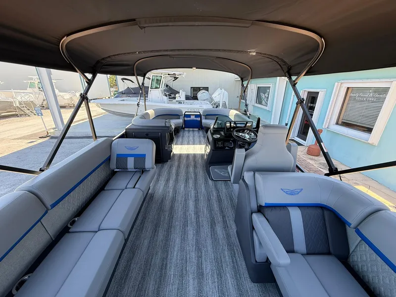 Slide: The Image of 2025 Bennington 24 MFB pontoon boat interior with spacious seating and modern design. - 8