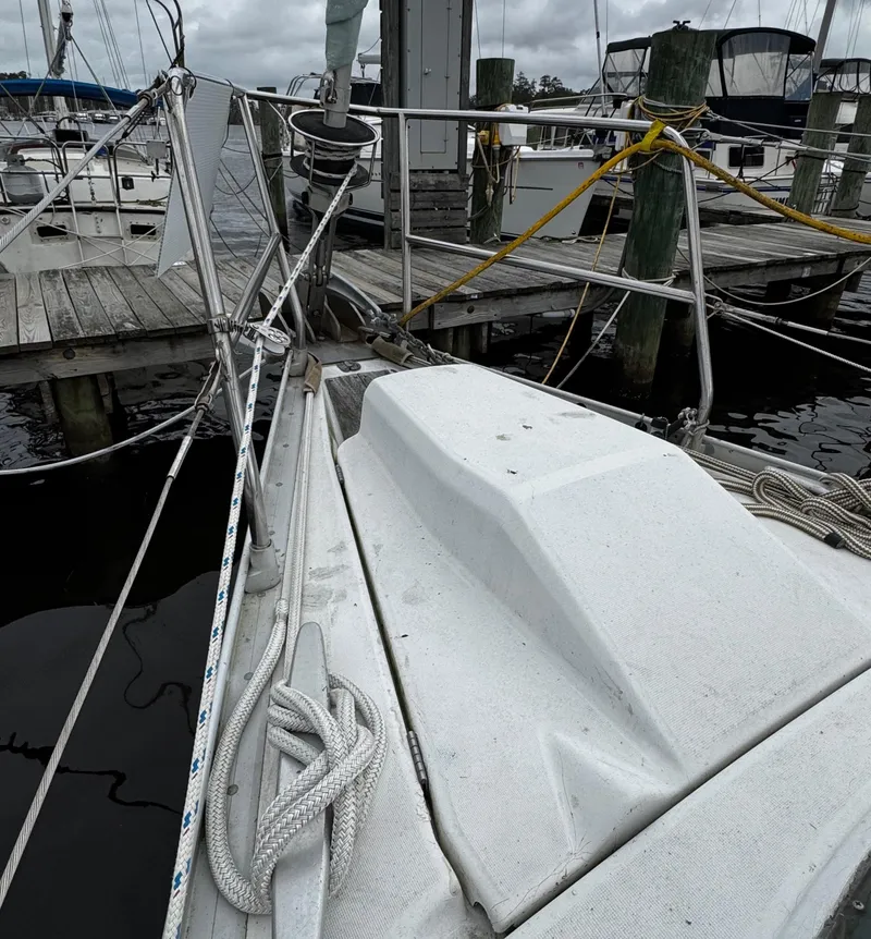Slide: The Image of Cockpit view of a 1994 Beneteau 40 sailboat with ropes and winches. - 20