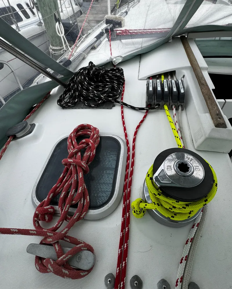 Slide: The Image of Cockpit entrance of a 1994 Beneteau 40 sailboat with BoatUS member sticker. - 35