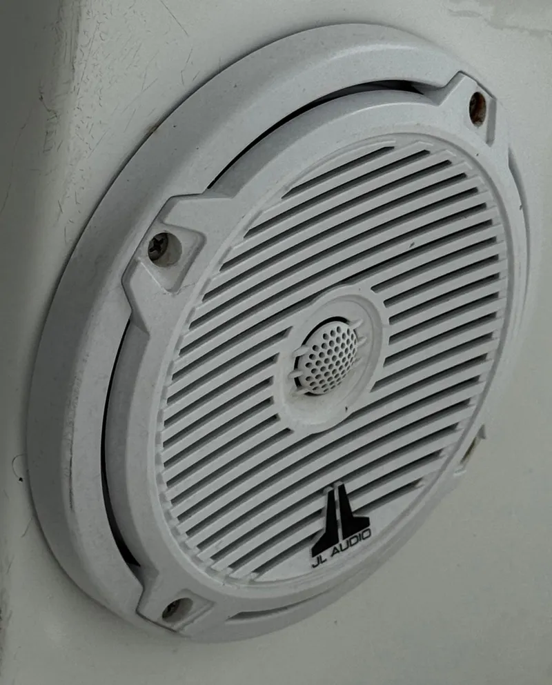 Slide: The Image of Newpowa solar charge controller mounted on wall. - 42