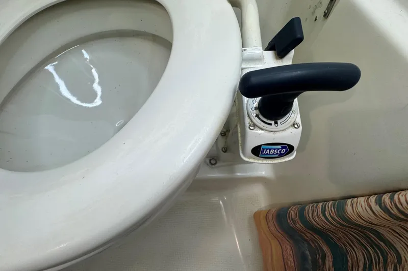 Slide: The Image of Jabsco marine toilet in 1994 Beneteau 40 yacht bathroom. - 47