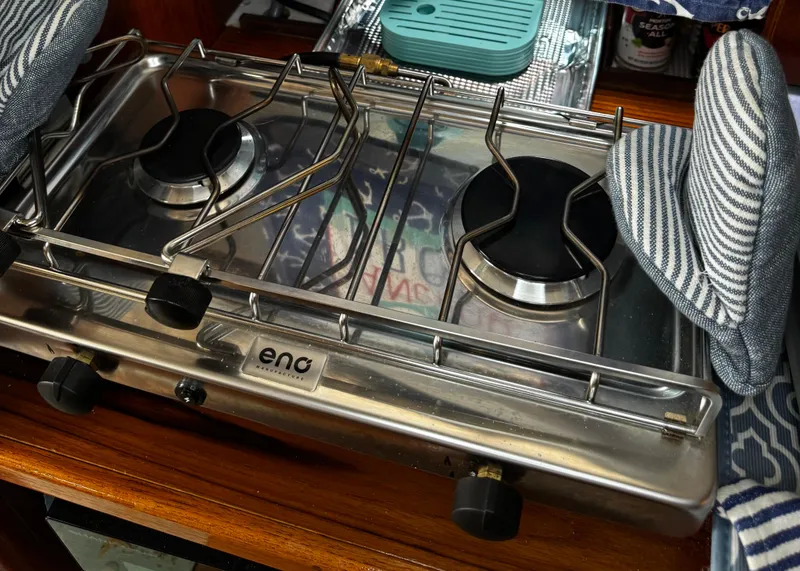 Slide: The Image of Interior of 1994 Beneteau 40 yacht with wooden finish and visible bathroom. - 56